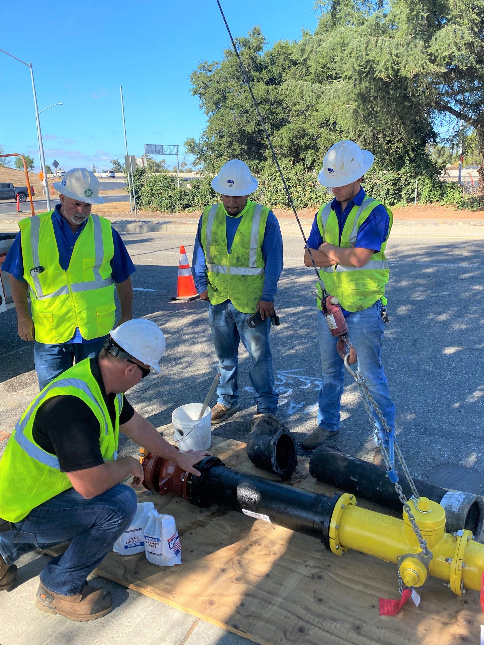 4 SJW workers with hydrant